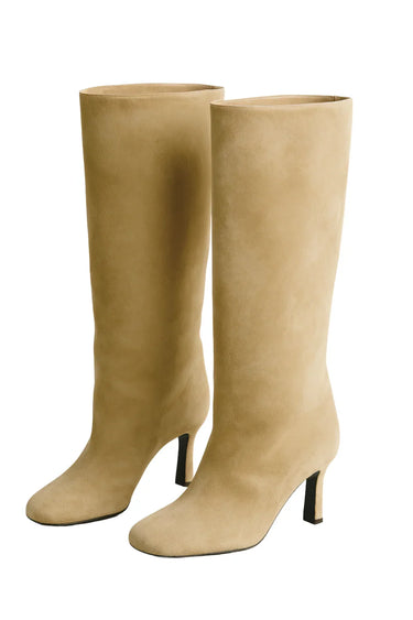 Beige knee-high boots on a white background